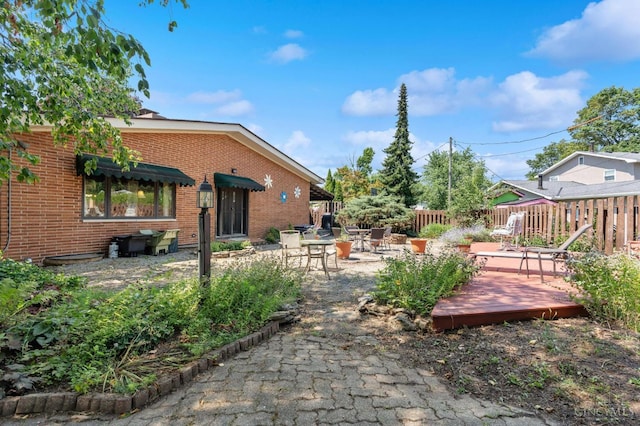 600 Kathryn Dr, Wilmington, OH 45177 - view of yard featuring a deck and a patio