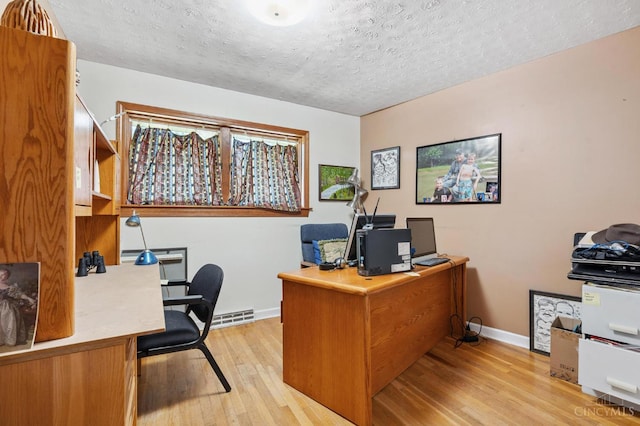 600 Kathryn Dr, Wilmington, OH 45177 - office with light wood-style floors and a textured ceiling