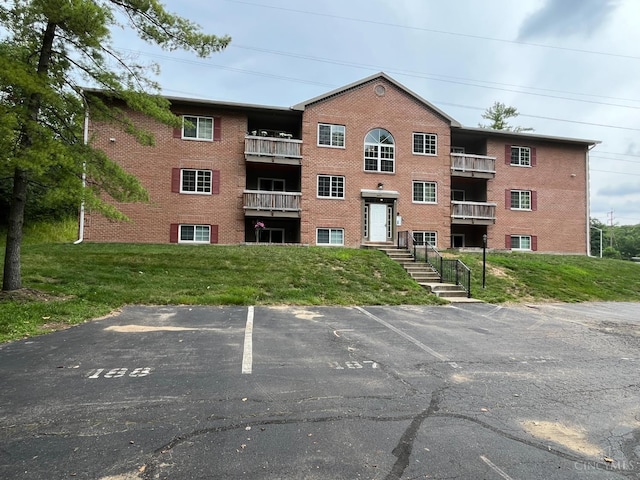 1605 W Augusta Blvd Unit 180, Fairfield, OH 45014 - view of property featuring uncovered parking