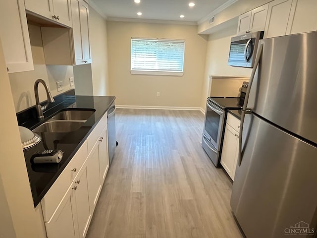 1605 W Augusta Blvd Unit 180, Fairfield, OH 45014 - kitchen featuring stainless steel appliances, crown molding, light wood finished floors, white cabinetry, and recessed lighting