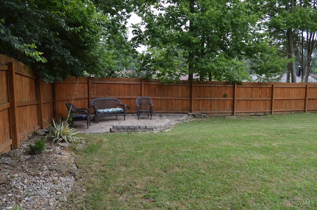 11528 Kenn Rd, Forest Park, OH 45240 - fenced backyard with a patio area