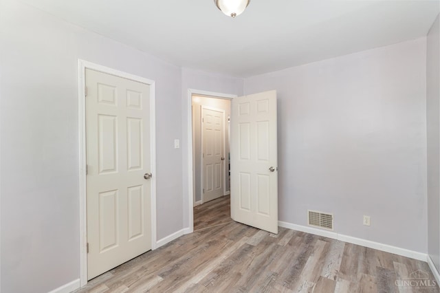 1127 Anderson Fry, Delhi Twp, OH 45238 - unfurnished bedroom with light wood-style flooring and baseboards