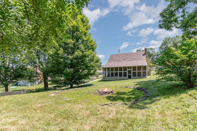 1127 Anderson Fry, Delhi Twp, OH 45238 - view of grassy yard with a sunroom