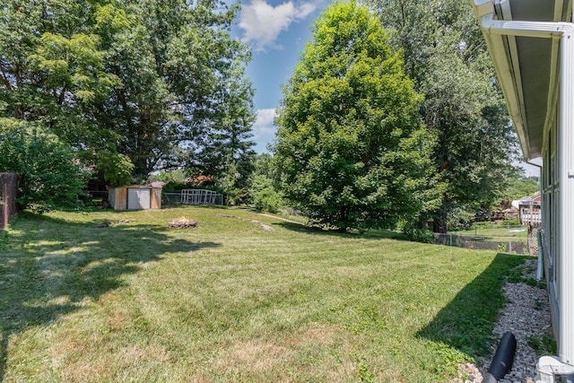 1127 Anderson Fry, Delhi Twp, OH 45238 - fenced backyard featuring a shed