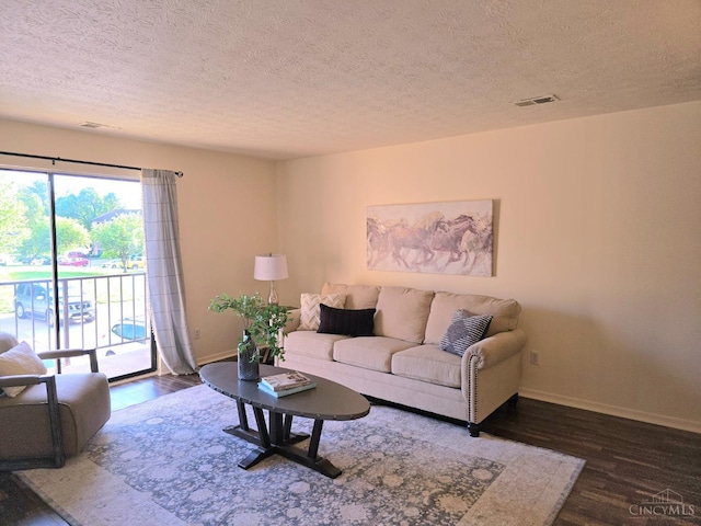 541 Davis Rd Unit 8, Pierce Twp, OH 45255 - living room with wood finished floors and a textured ceiling