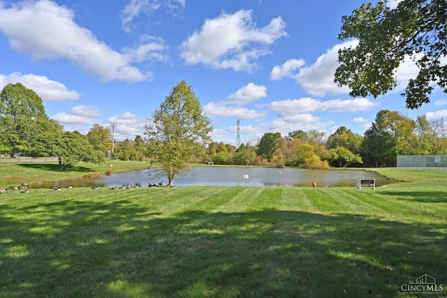 541 Davis Rd Unit 8, Pierce Twp, OH 45255 - view of green lawn with a water view and view of wooded area