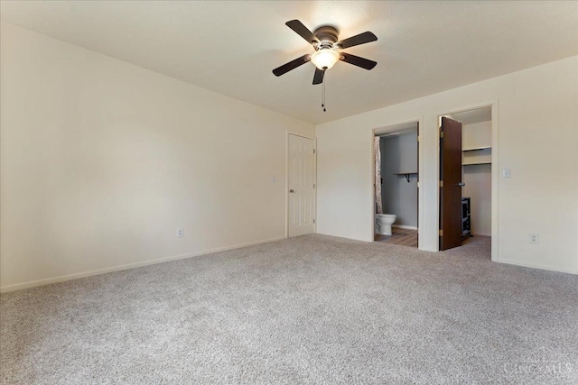 541 Davis Rd Unit 8, Pierce Twp, OH 45255 - unfurnished bedroom with carpet, ensuite bathroom, a walk in closet, and ceiling fan