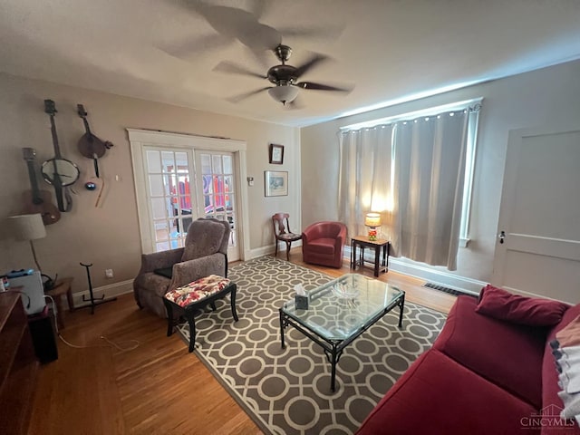 2464 Fairview Ave, Cincinnati, OH 45219 - living area with a ceiling fan and wood finished floors