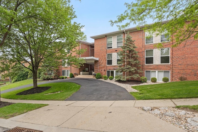 3566 Amberacres Dr Unit 1, Cincinnati, OH 45237 - view of property with asphalt driveway