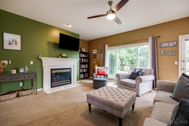 5088 Harvestdale Dr, Mason, OH 45040 - carpeted living area with ceiling fan and a tiled fireplace