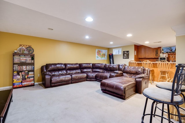 5088 Harvestdale Dr, Mason, OH 45040 - living room with light carpet, recessed lighting, and bar area