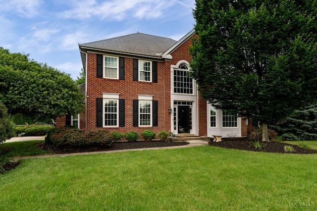 5088 Harvestdale Dr, Mason, OH 45040 - colonial house with a front yard, brick siding, and roof with shingles