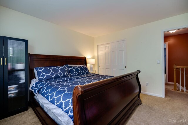 5088 Harvestdale Dr, Mason, OH 45040 - bedroom featuring light carpet and baseboards