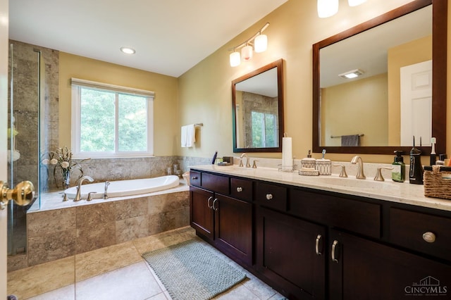 5088 Harvestdale Dr, Mason, OH 45040 - bathroom with double vanity, a bath, and tile patterned floors