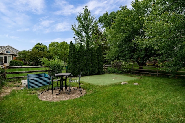 5088 Harvestdale Dr, Mason, OH 45040 - view of yard with a putting area