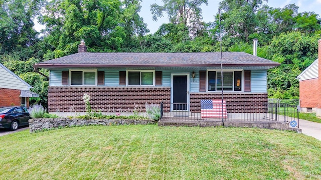 4321 Delhi, Delhi Twp, OH 45238 - view of front of home with brick siding, covered porch, a front yard, and a chimney