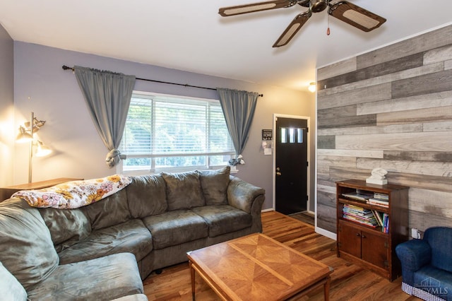 4321 Delhi, Delhi Twp, OH 45238 - living room featuring wooden walls, ceiling fan, and wood finished floors