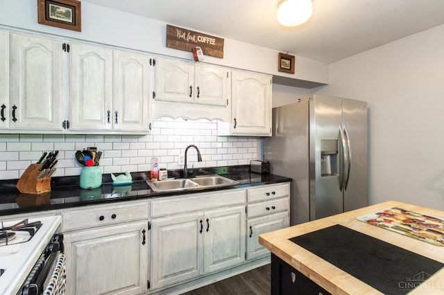 4321 Delhi, Delhi Twp, OH 45238 - kitchen featuring stainless steel fridge with ice dispenser, stove, butcher block counters, dark wood-style flooring, and tasteful backsplash