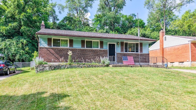 4321 Delhi, Delhi Twp, OH 45238 - view of front of home with covered porch, brick siding, and a chimney