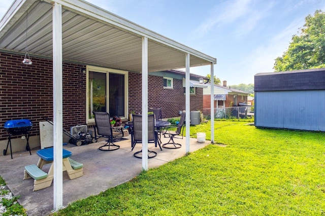 4321 Delhi, Delhi Twp, OH 45238 - view of patio featuring a storage shed and grilling area
