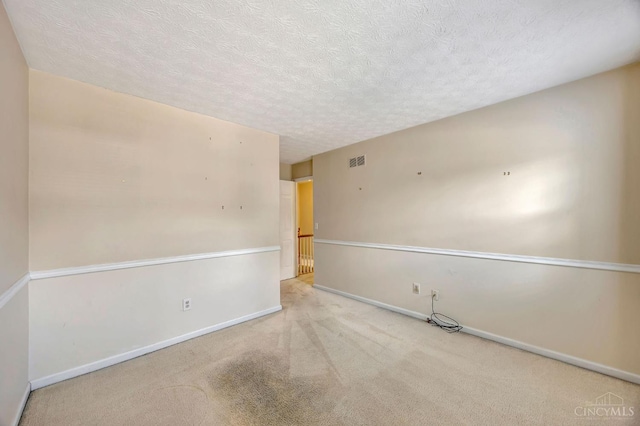 10854 Ponds Ln Unit 8, Sycamore Twp, OH 45242 - carpeted spare room featuring a textured ceiling and baseboards
