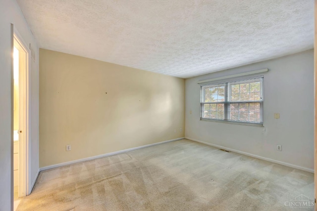 10854 Ponds Ln Unit 8, Sycamore Twp, OH 45242 - unfurnished room featuring carpet flooring and a textured ceiling