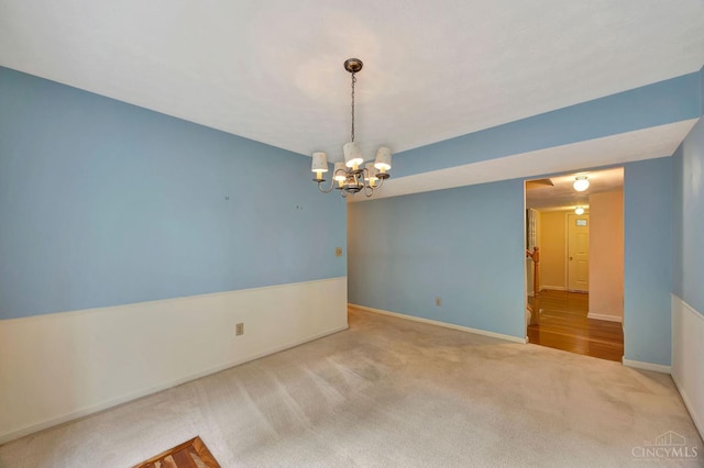10854 Ponds Ln Unit 8, Sycamore Twp, OH 45242 - carpeted empty room featuring a chandelier and baseboards