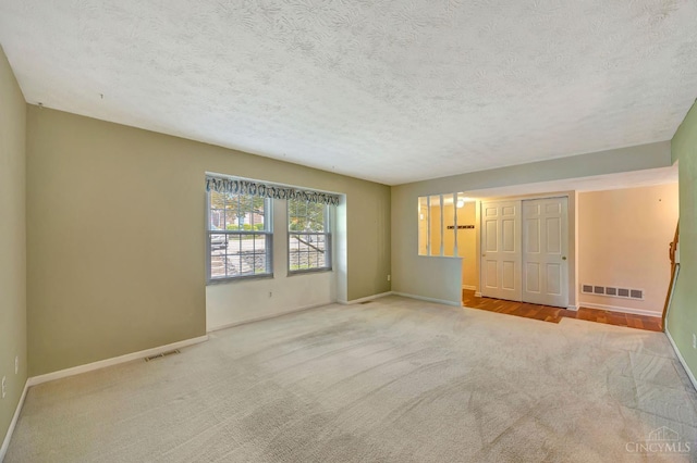 10854 Ponds Ln Unit 8, Sycamore Twp, OH 45242 - unfurnished bedroom with carpet and a textured ceiling