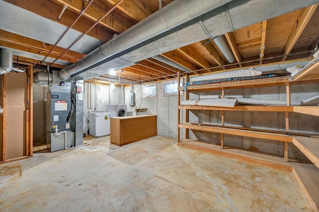 10854 Ponds Ln Unit 8, Sycamore Twp, OH 45242 - below grade area with independent washer and dryer, heating unit, and electric panel