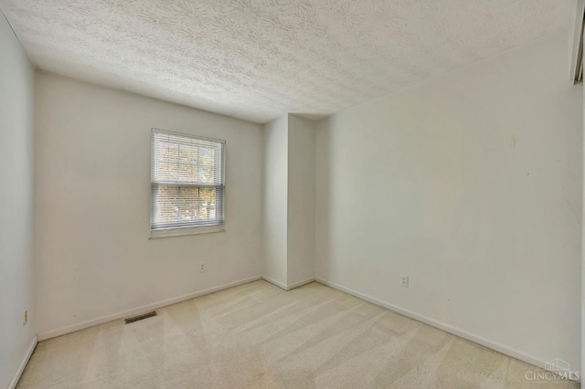 10854 Ponds Ln Unit 8, Sycamore Twp, OH 45242 - spare room featuring a textured ceiling and carpet floors