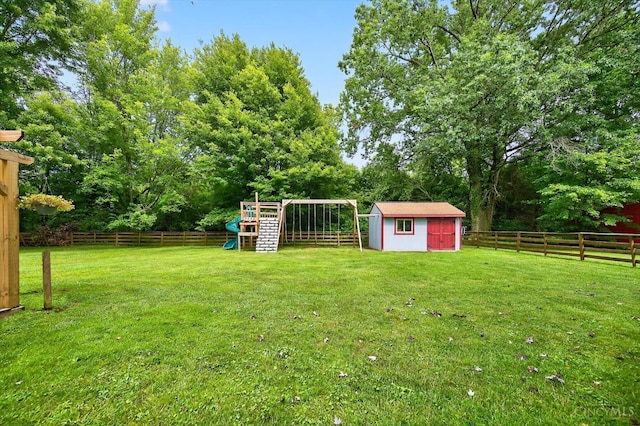 5744 Melody Ln, Milford, OH 45150 - fenced backyard with a playground and a storage unit