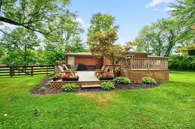 5744 Melody Ln, Milford, OH 45150 - back of property featuring a wooden deck, brick siding, and a chimney