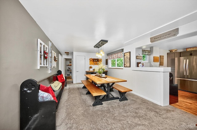 5744 Melody Ln, Milford, OH 45150 - carpeted dining area featuring baseboards