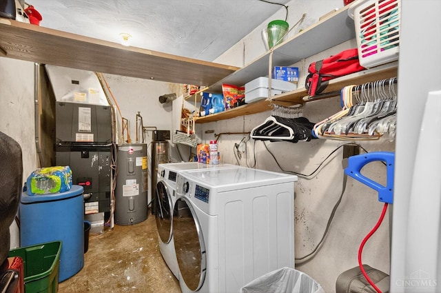 5744 Melody Ln, Milford, OH 45150 - laundry room featuring electric water heater, washer and clothes dryer, and heating unit