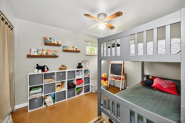 5744 Melody Ln, Milford, OH 45150 - bedroom featuring wood finished floors, a closet, and a ceiling fan