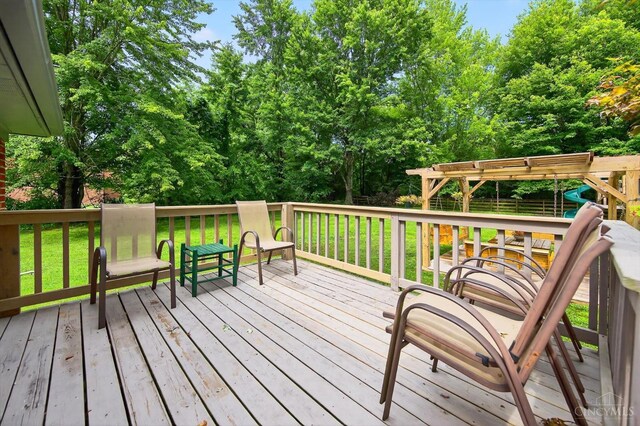 5744 Melody Ln, Milford, OH 45150 - wooden deck featuring view of wooded area