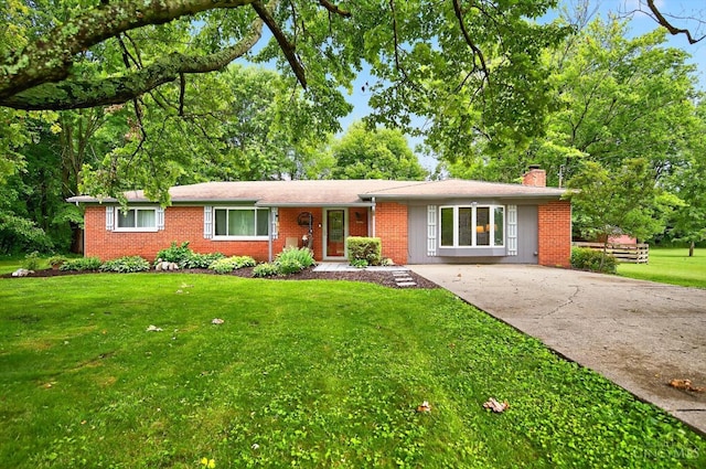 5744 Melody Ln, Milford, OH 45150 - ranch-style home with a chimney, brick siding, concrete driveway, and a front yard