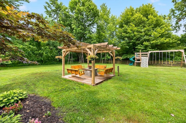 5744 Melody Ln, Milford, OH 45150 - view of yard with a playground, a pergola, a wooden deck, and view of wooded area