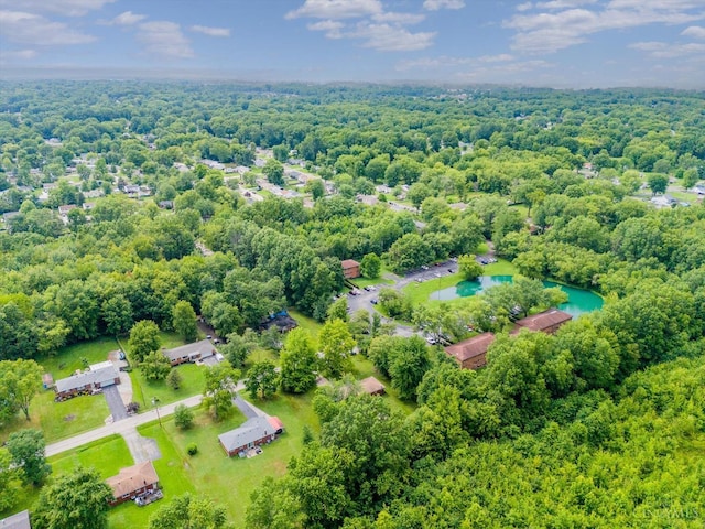 5744 Melody Ln, Milford, OH 45150 - aerial view of a pool and a heavily wooded area
