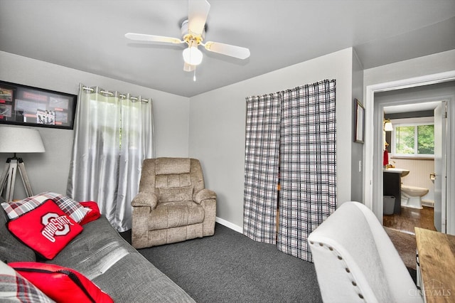 5744 Melody Ln, Milford, OH 45150 - living room featuring a ceiling fan and baseboards