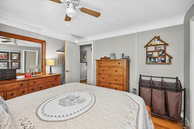 5744 Melody Ln, Milford, OH 45150 - bedroom featuring wood finished floors and a ceiling fan