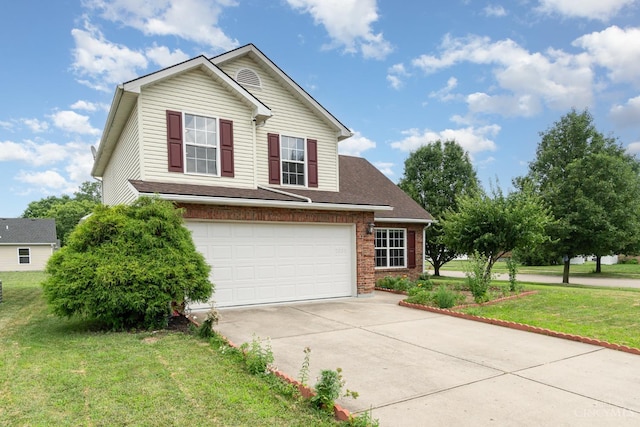 2033 Jackson Ln, Middletown, OH 45044 - traditional home with driveway, an attached garage, a front yard, and brick siding