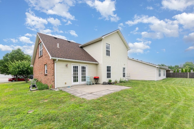 2033 Jackson Ln, Middletown, OH 45044 - back of house featuring a patio, roof with shingles, and brick siding