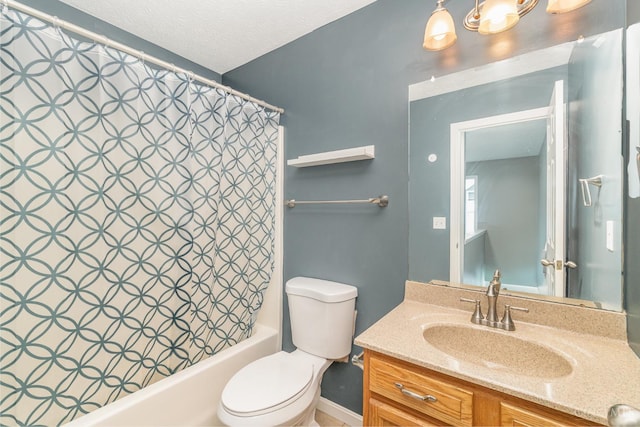 2033 Jackson Ln, Middletown, OH 45044 - full bathroom featuring vanity, shower / bath combo with shower curtain, and a textured ceiling