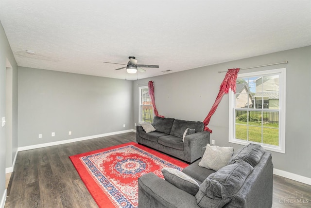 2033 Jackson Ln, Middletown, OH 45044 - living room featuring dark wood finished floors, plenty of natural light, and a ceiling fan