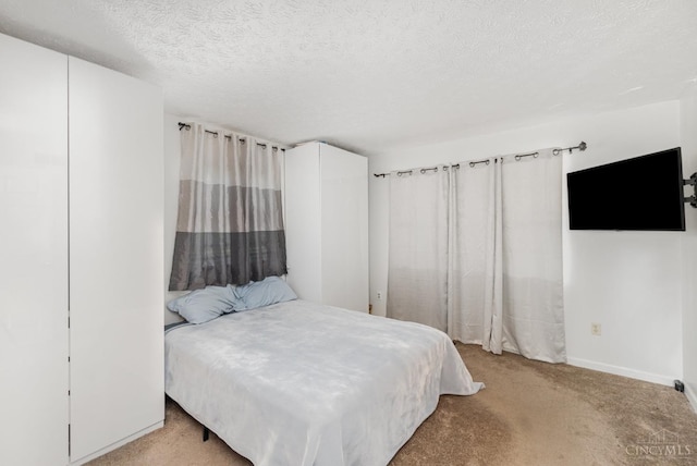 11818 Cloverlick Rd, Bethel, OH 45106 - bedroom with light colored carpet and a textured ceiling