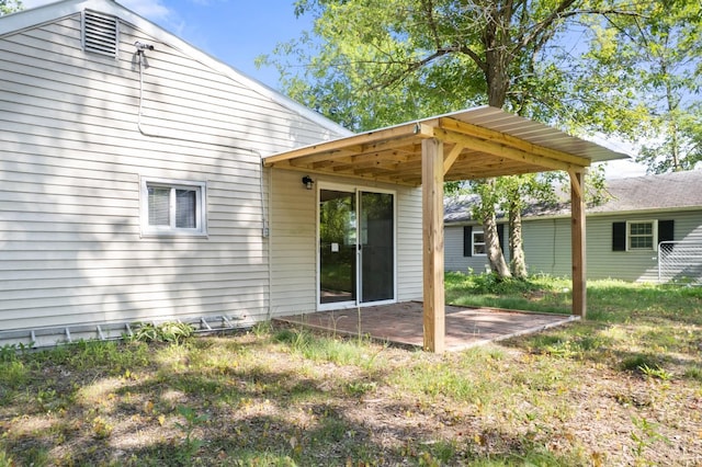 340 N E St, Bethel, OH 45106 - rear view of house with a patio area