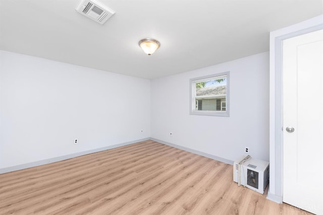 340 N E St, Bethel, OH 45106 - unfurnished bedroom with light wood-style floors and baseboards
