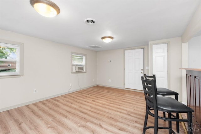 340 N E St, Bethel, OH 45106 - dining space with wood finished floors, plenty of natural light, and cooling unit
