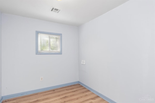 340 N E St, Bethel, OH 45106 - empty room featuring baseboards and light wood finished floors